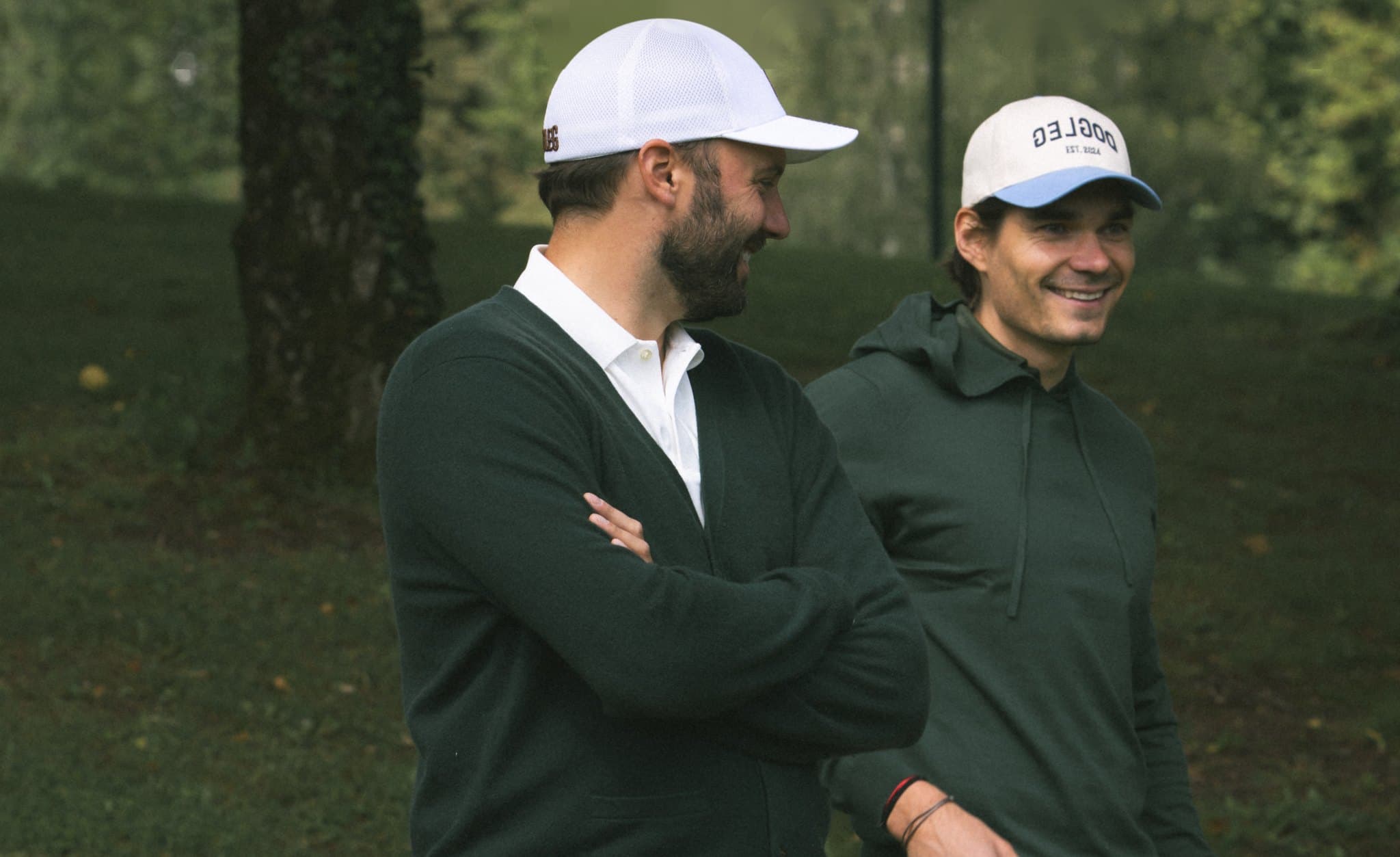 Two golfers in Dogleg green cashmere on the course — Father & Son Links Edition