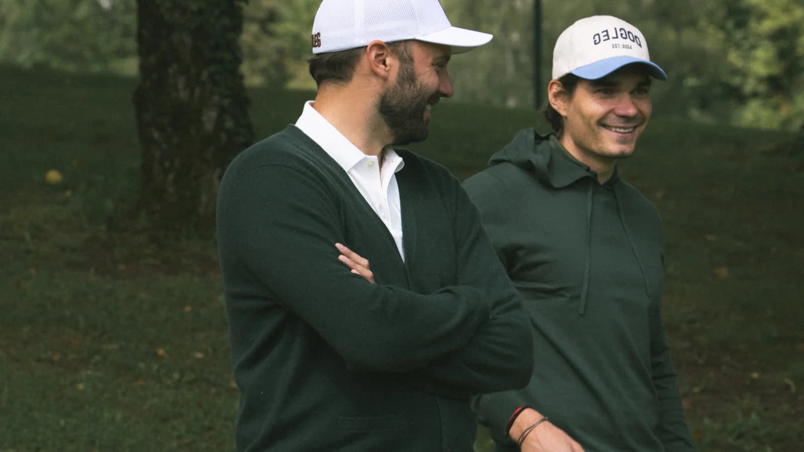 Two golfers in Dogleg pieces out on the course